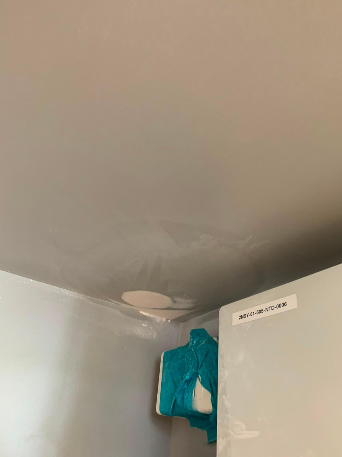 The filled area feathered flush, equipment taped over